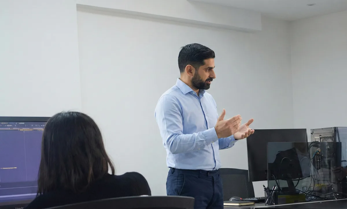 Tarek Saab, founder of Logisoft, presenting to the team